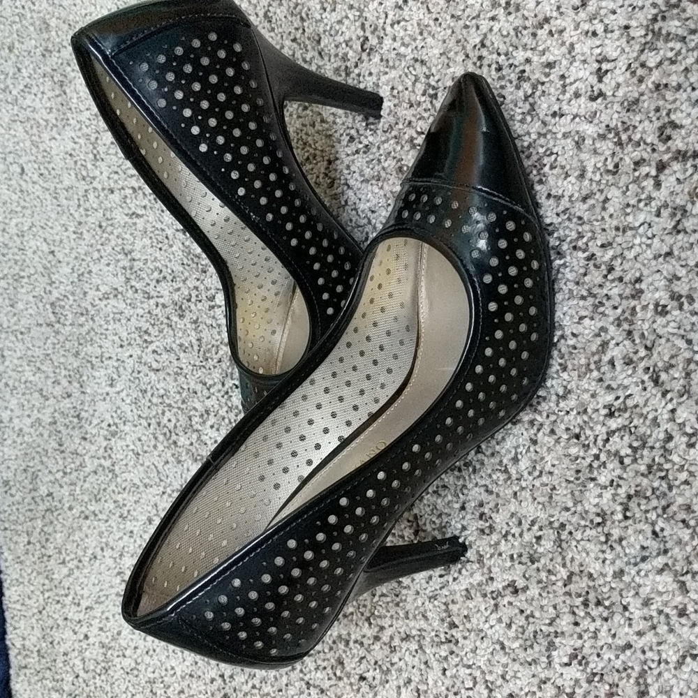 Women's black heels with cutout pattern